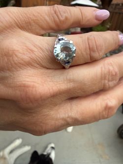 Genuine 2.5 carat aquamarine with sapphire and diamonds