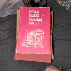 vintage hardcover book titled "Phyllis Diller's Housekeeping Hints" written by the famous comedian Phyllis Diller. 