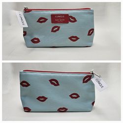 Clinique x Kate Spade Aqua blue with Red Lips Makeup Cosmetic Bag, Pouch New 2023 with tag. Zipper closure. Approximate dimensions 9" L x 4.75" H x 2.