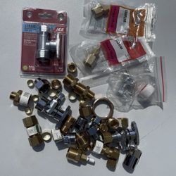Assorted plumbing connectors unused