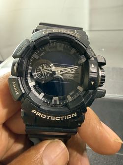 : Casio G-Shock GA-400GB Black Watch Needs Battery Description: Casio G-Shock GA-400GB men's watch. Previously working, but batteries have run out. Go