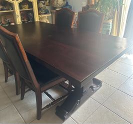 Dark wood trestle Dining Table with 6 chairs