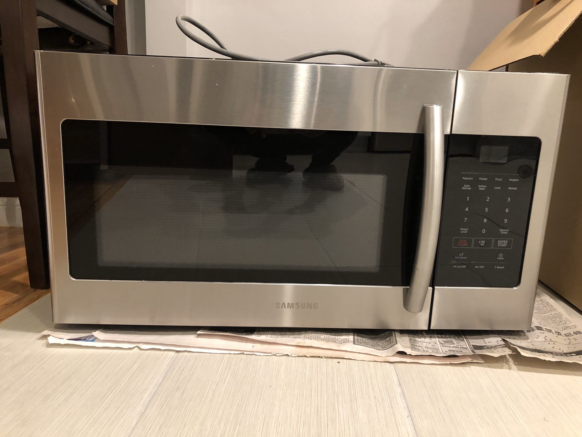 Brand new Samsung over the range microwave