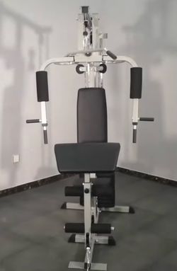 Everyday essentials home gym,  includes 125 pounds of weight