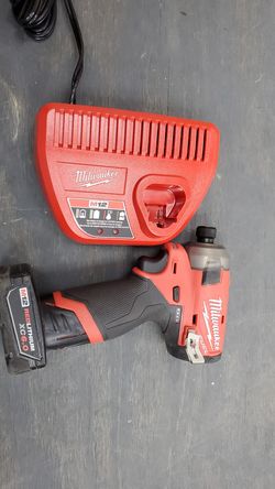 Milwaukee Fuel Surge M12 impact with 6.0battery and charger 150$!!!