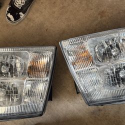 Escalade OEM headlights