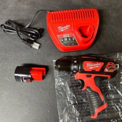 Milwaukee New Kit 1/4” Drill M12 And Battery , Charger 