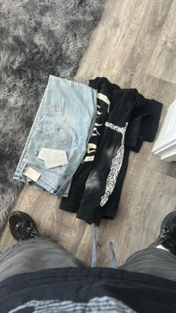 Two hellstar shirts and purple jeans