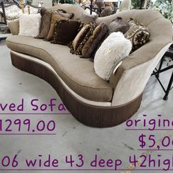Sofa Curved W/pillows Fringe BaseWe are located at 2811 East Bell road. Another Time Around Furniture.
