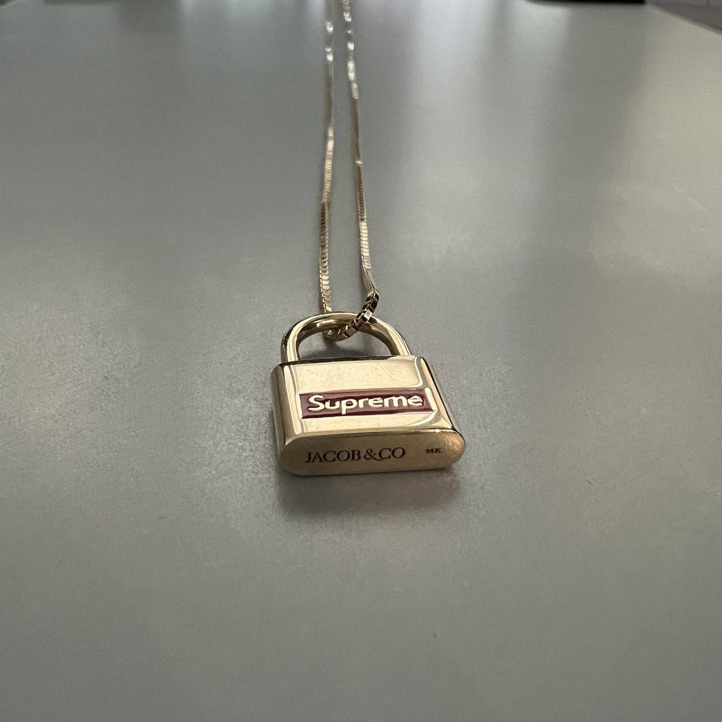 Supreme Jacob & Co. 14k Gold Lock Pendant for Sale in Portland, OR - OfferUp