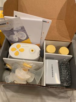 2 MEDELA PUMPS, 2 STYLISH TRAVEL BAGS, Hands free nursing bra and 300 milk storage bags!