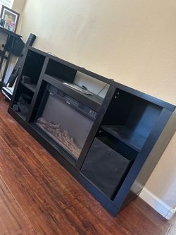 Tv console with fireplace