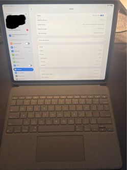iPad Pro 12.9 4th gen LTE with keyboard accessories