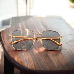 Gucci GG0852SK Oversized Square Sunglasses – Gold Metal Frame
