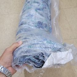 A Full Roll Of Thin Stretch Fabric Material as Per Attached Photos . In Original Packaging
