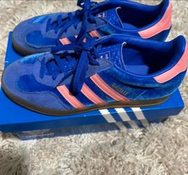 Blue and pink Adidas Gazelles