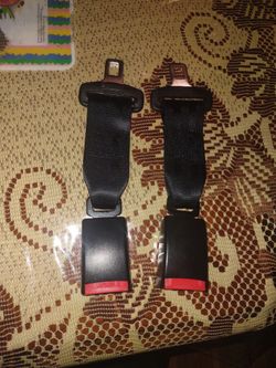 Seat belt extender clips