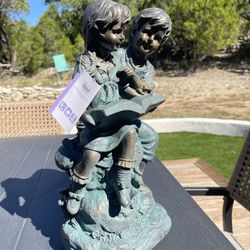Statue Boy And Girl Reading From Alpine New