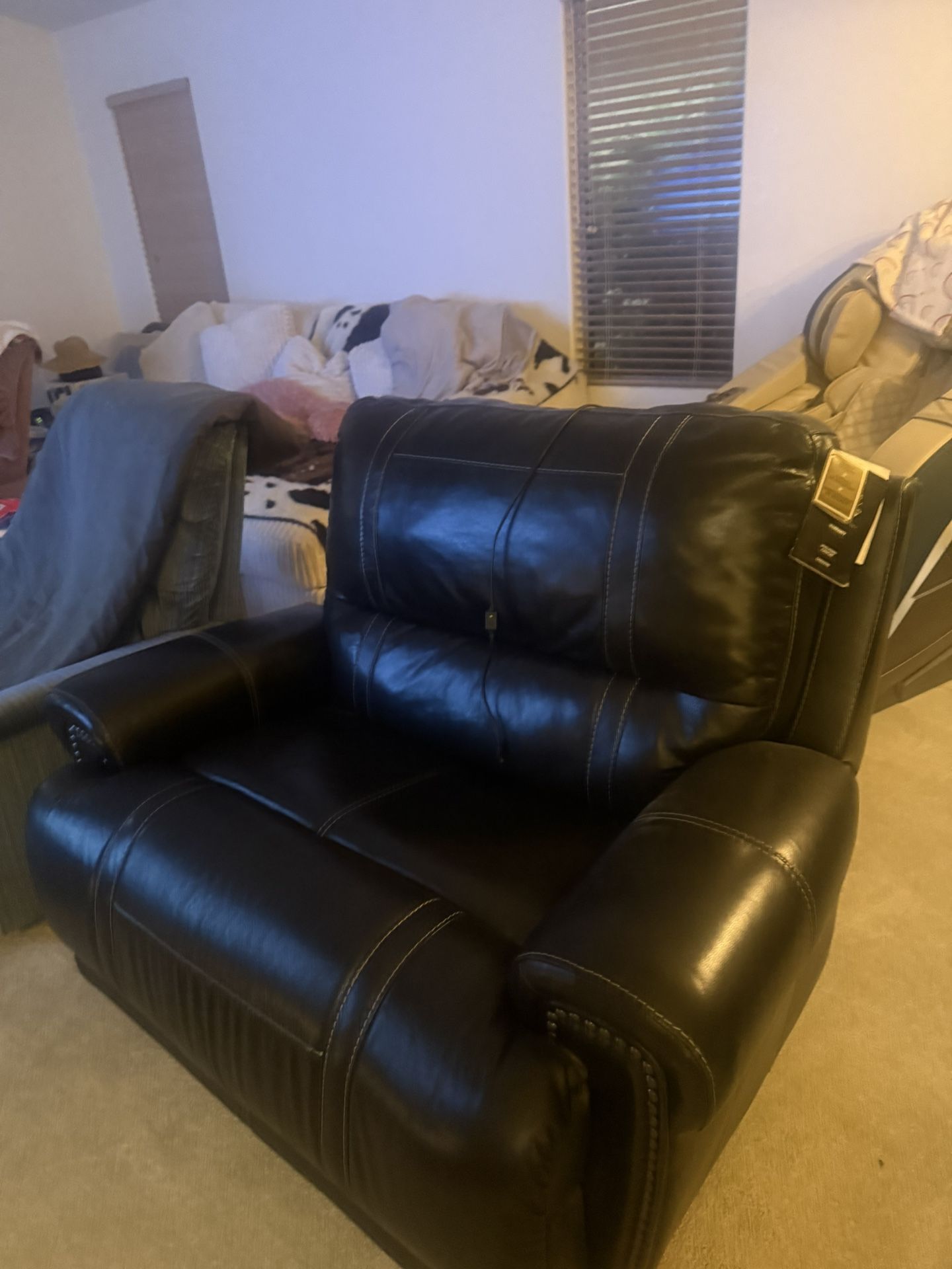 Matching Recliner, an electric reclining loveseat