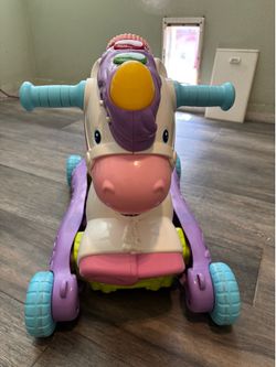 Vtech Baby/Toddler unicorn ride on toy.