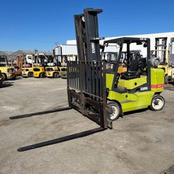 2013 Clark 12,000 Lbs Propane Forklift  Year:	2013 Manufacturer:	Clark 2 Stage Carriage Opens More #:	CGC50L Serial #:	CGC470L00419861 t