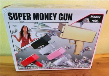 Super Money Gun Gold. Comes Ready To Use.
