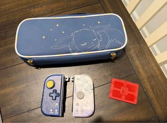 Nintendo Switch Sleeping Eevee case and Controllers
