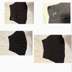 Black pleated mini skirt