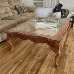 Solid wood coffee table with glass top