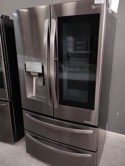 LG grey four door refrigerator with warranty Delivery available fee depends on address 🛣️🏠🚛