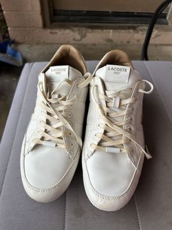 Men's Lacoste 1927 brand tennis shoes, size 9.
