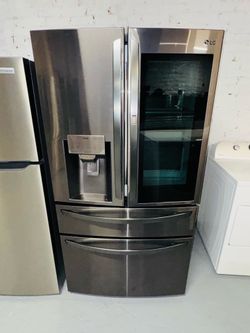 LG stainless steel refrigerator (36" x 69" x 31"); includes a receipt for a 90-day warranty.