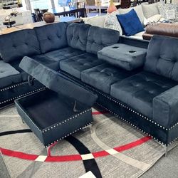 Black Reversible Sectional with Drop Down and Storage Ottoman
