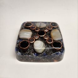 handmade  orgonite is a unique addition to any collection.  The size of this orgonite is large, making it standout piece in any display.
Weighs more t