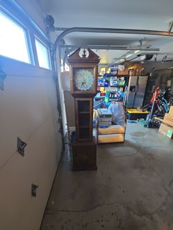 Handmade clock, it is 6 foot, 4, tall, 16, and a 1/2 wide, and it's 10 and a 1/2 deep.
