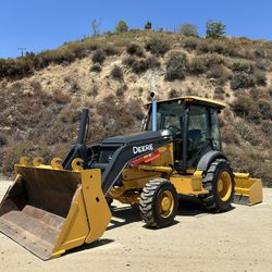 John Deere 210LJ Enclosed Skip Loader 