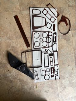 Miata faux wood trim dashes pieces - fits 1999-?  Almost full set mining one I think