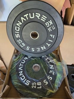 1300lb of 25lb Signature Fitness Bumper Plates