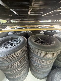 Brand new 205/75R15 Tire on 5-Lug Rim