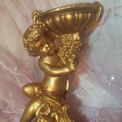 Golden Cherub Statue