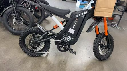 GT16 electric bike with 16-inch tires, peak power 749W, comes with a 48V 25AH battery, range of 65 miles, and hydraulic brakes.