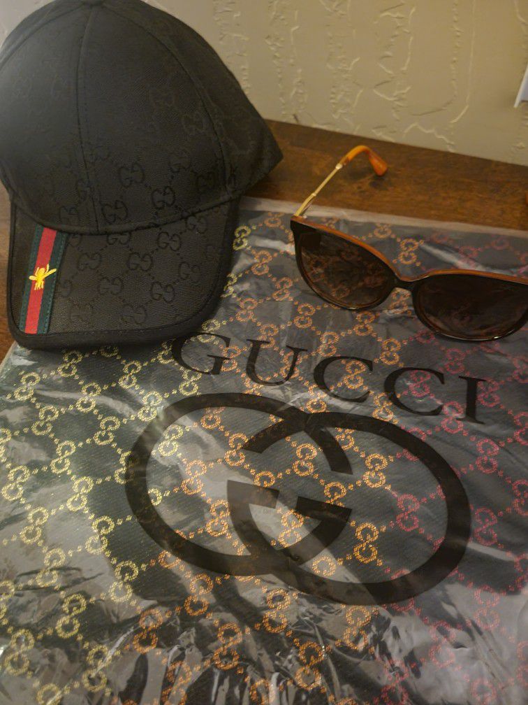 Gucci scarf,  Sunglasses, Hat, & Jacket