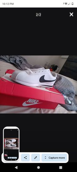 White & black Nike Cortez
