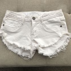 Women’s White Fringed Jean Shorts