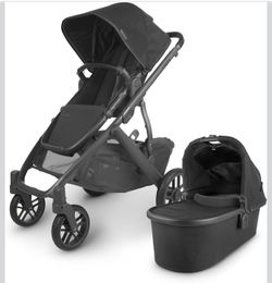 UPPAbaby Vista V2 Stroller / Convertible Single-To-Double System / Bassinet, Toddler Seat, Bug Shield, Rain Shield, and Storage Bag Included / Jake (C