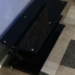 Smooth. Very Strong, Black Glass & Metal TV Stand/Entertainment Center.