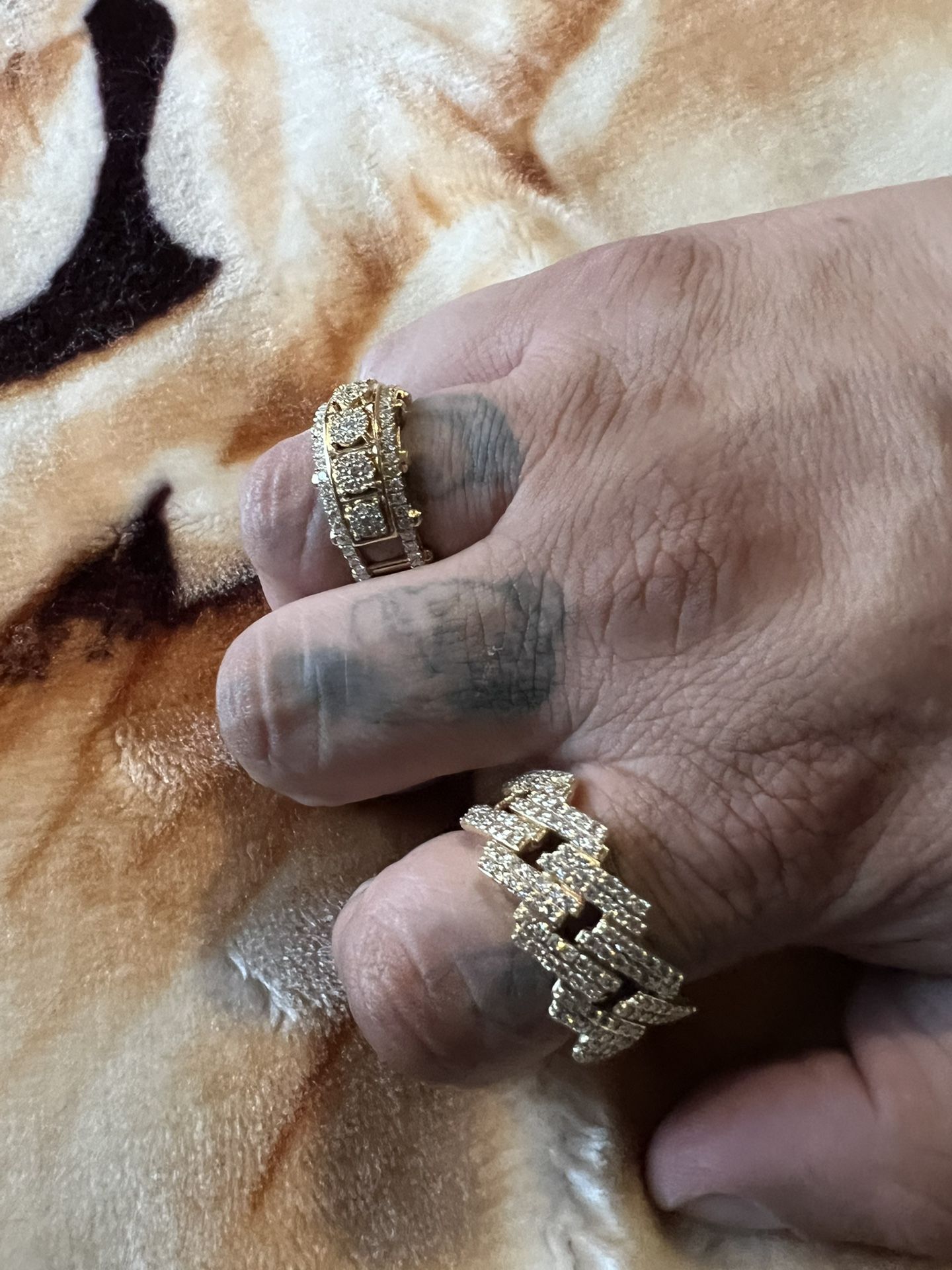 (FOR MEN) Ring Finger Is A 10k 2 Carat VVS diamond & The Index Finger Is A 14k 1.5 Carat VS diamond Ring. Both Rings For $3,200 Or $1,500 Each.