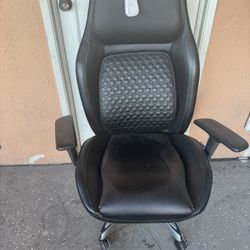 Chair And Part Of A Shelf