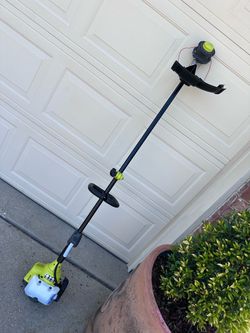 RYOBI 25 cc 2-Stroke Attachment Capable Full Crank Straight Gas Shaft String Trimmer
