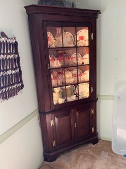 Henkel Harris mahogany tall corner cabinet